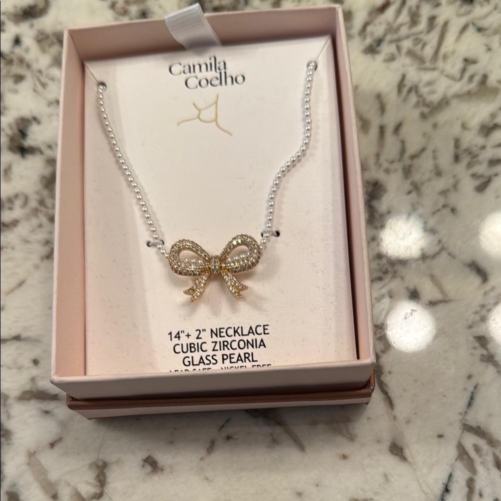 Camila Coelho glass pearlNecklace., cubic zirconia 
In gift box .. bow